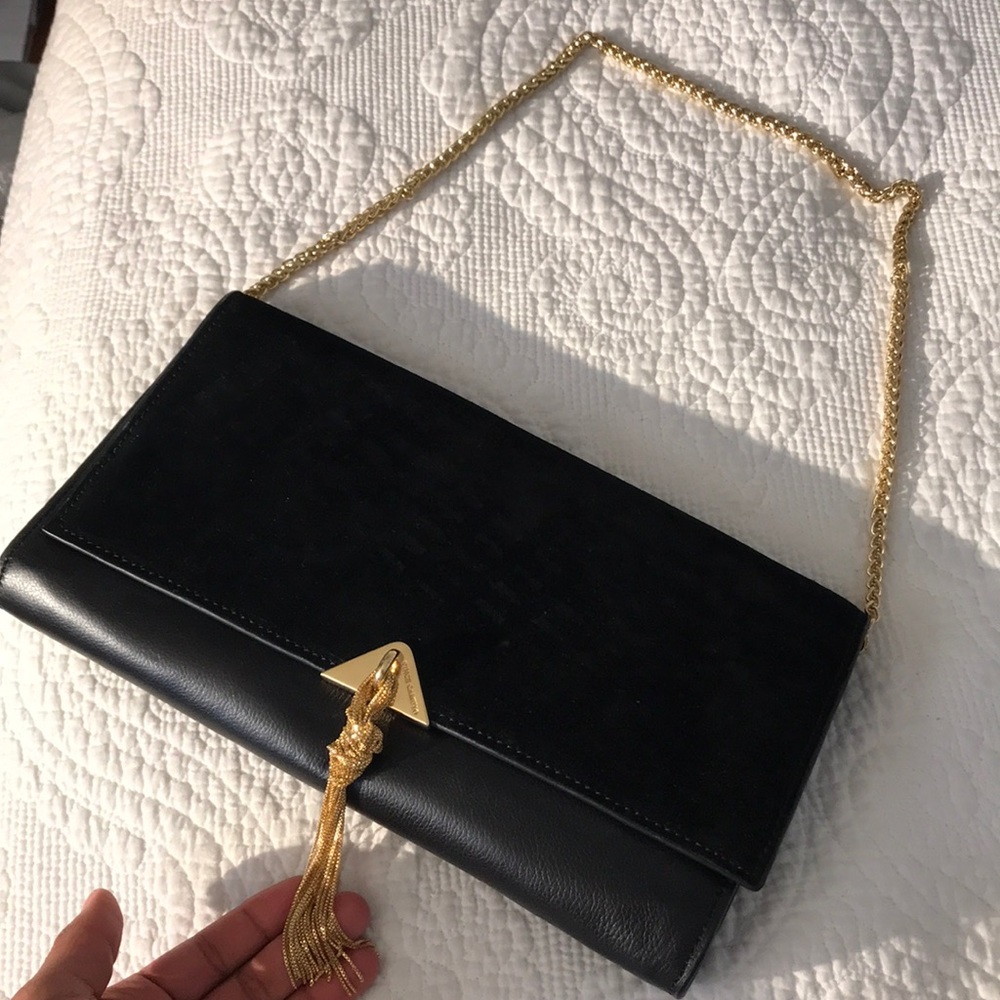 Vince Camino gold tassel clutch